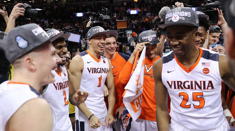 Virginia players celebrate after defeating North Carolina for the 2018 ACC championship. The Cavaliers are the No. 1 seed in the NCAA South region, whose champion will be determined at Philips Arena. (Photo by Abbie Parr/Getty Images)