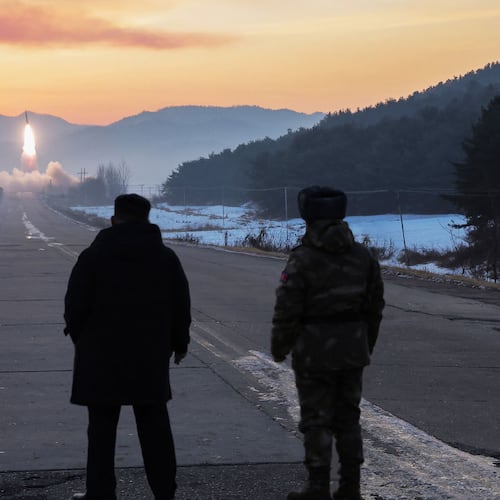 In this photo provided by the North Korean government, leader Kim Jong Un, center, inspects test-flights of hypersonic missiles, in Pyongyang, North Korea, Sunday, Jan. 4, 2026. Independent journalists were not given access to cover the event depicted in this image distributed by the North Korean government. The content of this image is as provided and cannot be independently verified. (Korean Central News Agency/Korea News Service via AP)