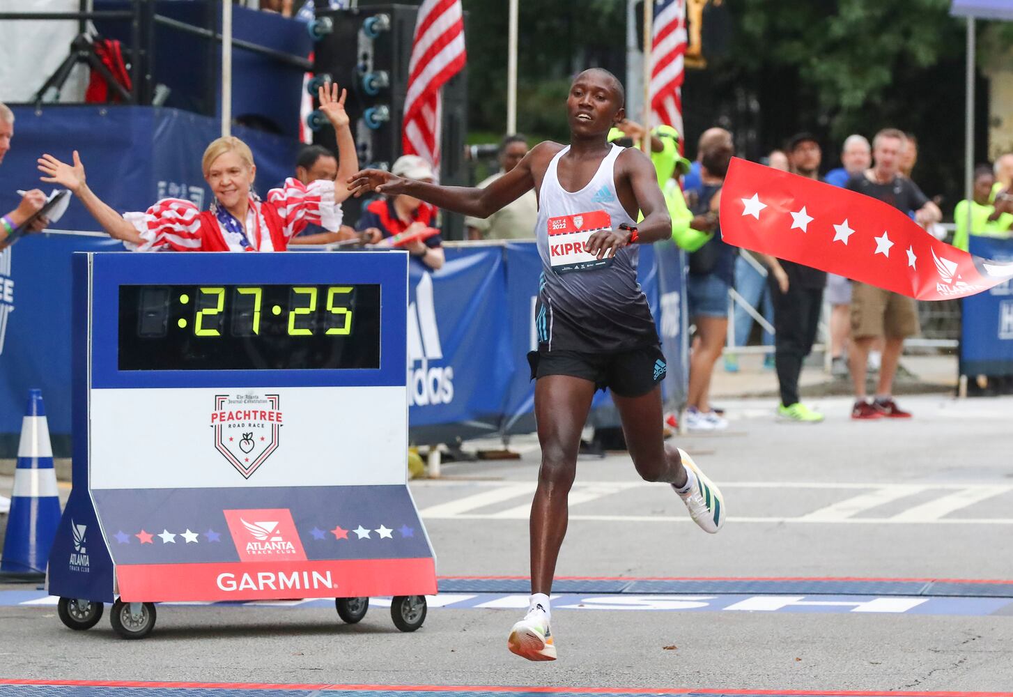 Rhonex Kipruto wins in the Men's Elite division of the 53rd running of the Atlanta Journal-Constitution Peachtree Road Race in Atlanta on Monday, July 4, 2022. (Curtis Compton / Curtis.Compton@ajc.com)