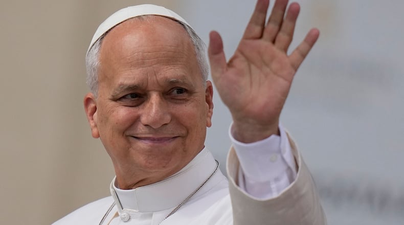 Pope Leo XIV arrives for his weekly general audience in St. Peter's Square, at the Vatican, Wednesday, May 13, 2026. (AP Photo/Alessandra Tarantino)