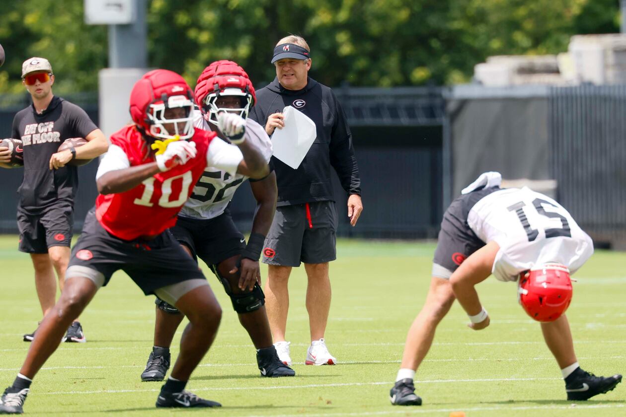 Georgia coach Kirby Smart observes his team during its first football practice Wednesday, Aug. 5, 2026, in Athens. (Miguel Martinez/AJC)
