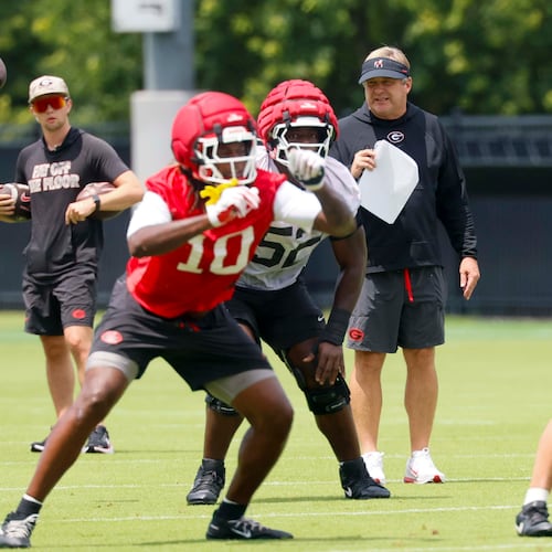Georgia coach Kirby Smart observes his team during its first football practice Wednesday, Aug. 5, 2026, in Athens. (Miguel Martinez/AJC)