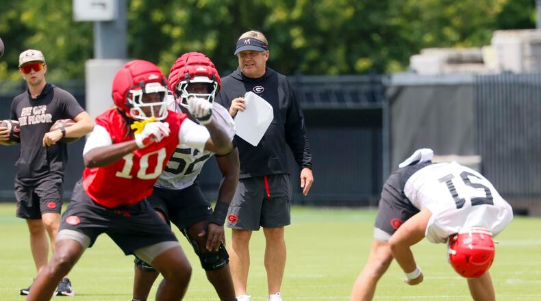 Georgia coach Kirby Smart observes his team during its first football practice Wednesday, Aug. 5, 2026, in Athens. (Miguel Martinez/AJC)