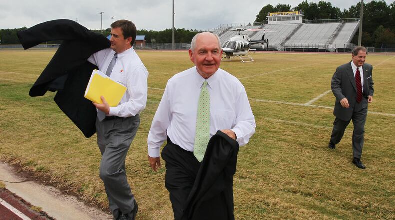 Bert Brantley (left), Governor Sonny Perdue (center) and Georgia State School Superintendent, Brad Bryant (right) in 2010. John Spink jspink@ajc.com