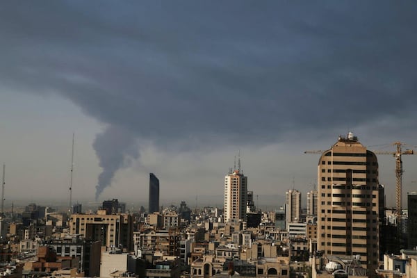 Huge smoke rises up from an oil facility facility after it appeared to have been hit by an Israeli strike Saturday, in southern Tehran, Iran, Sunday, June 15, 2025. (AP Photo)