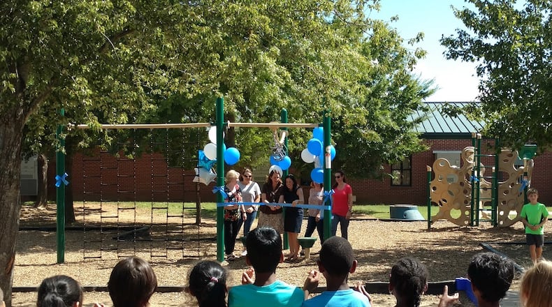 Settles Bridge Elementary in Suwanee held a ribbon cutting ceremony for new playground equipment at the school.