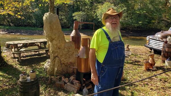 During the Sorghum Festival in Blairsville, sorghum syrup makers make the syrup while attendees watch.