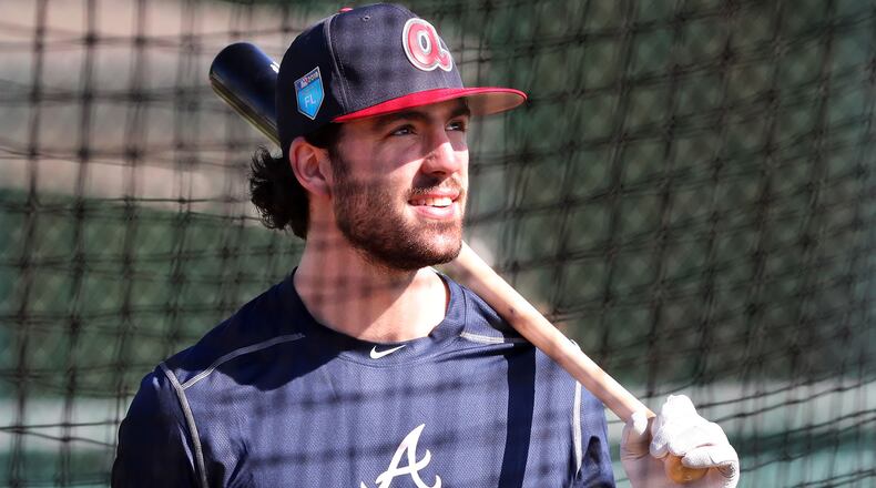 Braves’ Dansby Swans takes some batting practice on Friday, Feb 16, 2018, at the ESPN Wide World of Sports Complex in Lake Buena Vista.     Curtis Compton/ccompton@ajc.com