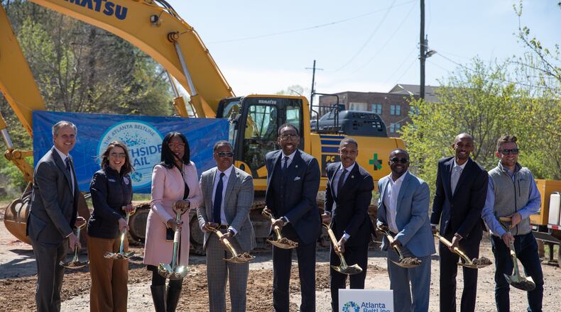 Atlanta Mayor Andre Dickens (center) celebrates the groundbreaking of the Southside trail of the BeltLine with project and community leaders on March 13, 2023. (Riley Bunch/riley.bunch@ajc.com)