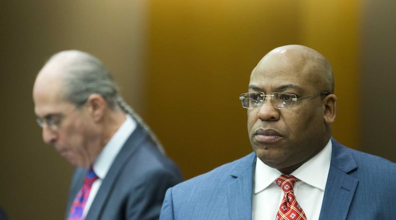 04/10/2018 — Atlanta, GA - Fulton County Chief Assistant District Attorney Clint Rucker, right, debates with defense attorney Bruce Harvey, left. ALYSSA POINTER/ALYSSA.POINTER@AJC.COM