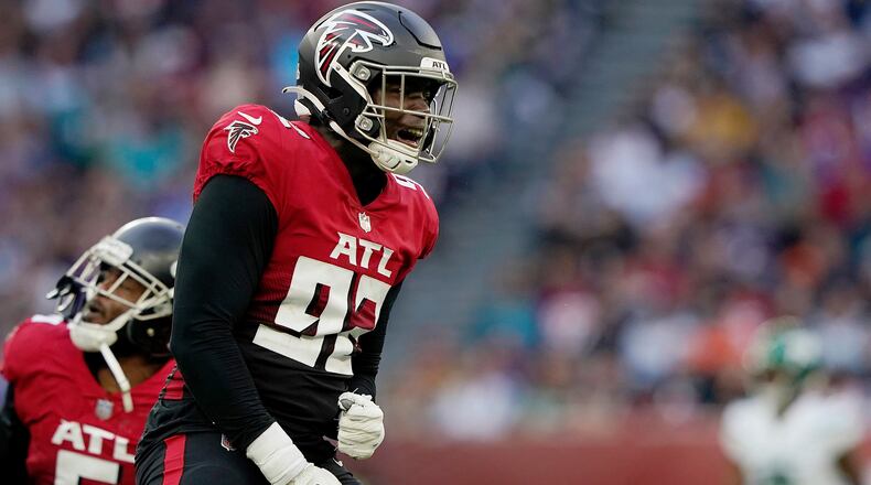 Falcons linebacker Adetokunbo Ogundeji (92) reacts after a play against the New York Jets Sunday, Oct. 10, 2021, at Tottenham Hotspur Stadium in London. The Falcons won 27-20. (Steve Luciano/AP)
