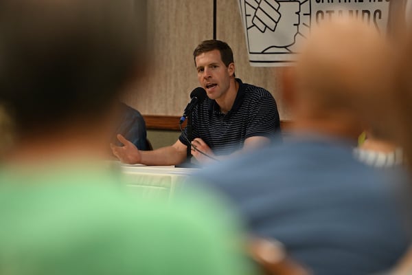 Conor Lamb speaks to the crowd at a town hall-style event organized by progressive groups at Central Penn College, Sunday, June 22, 2025, in Enola, Pa. (AP Photo/Marc Levy)