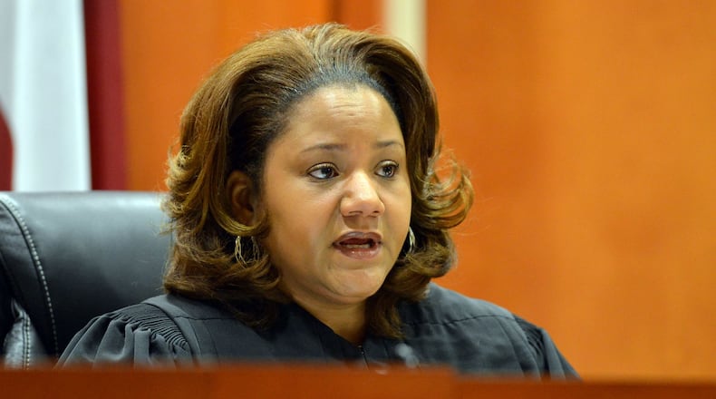 Dekalb Superior Court Judge Courtney L. Johnson presides over Thursday’s hearing. Suspended Dekalb County CEO Burrell Ellis appears in a hearing in Dekalb County Superior Court Thursday, January 23, 2014. Ellis’ attorneys called District Attorney Robert James to the stand after the state lost on a motion to quash his appearance. KENT D. JOHNSON/KDJOHNSON@AJC.COM