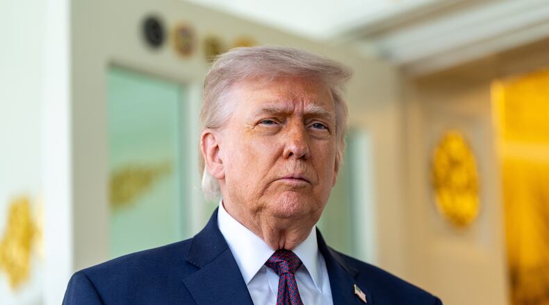President Donald Trump speaks with reporters outside the Oval Office of the White House, Monday, April 13, 2026, in Washington. (AP Photo/Alex Brandon)