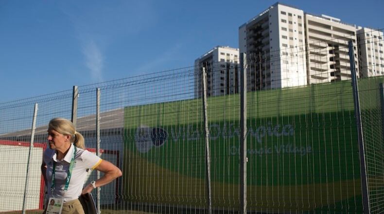 The head of the Australian delegation Kitty Chiller speaks during a press conference outside the Olympic Village in Rio de Janeiro, Brazil, Sunday, July 24, 2016. Chiller said that Australian athletes will not move into their rooms at the Rio de Janeiro Olympics until serious plumbing, electrical and cleaning problems are fixed, with the troubled South American games opening in under two weeks. (AP Photo/Leo Correa)