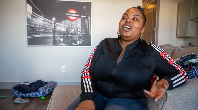 Anisa Green poses for a photograph in her Atlanta Apartment Friday, Oct. 22, 2021. Anisa Green, who participated in the AJC poll, said she had attended a couple of Kasim Reed events and likes that he’s “aligning himself with the hip-hop community,” but is still unsure who has her vote — Felicia Moore, she said, wasn’t progressive enough.
 STEVE SCHAEFER FOR THE ATLANTA JOURNAL-CONSTITUTION