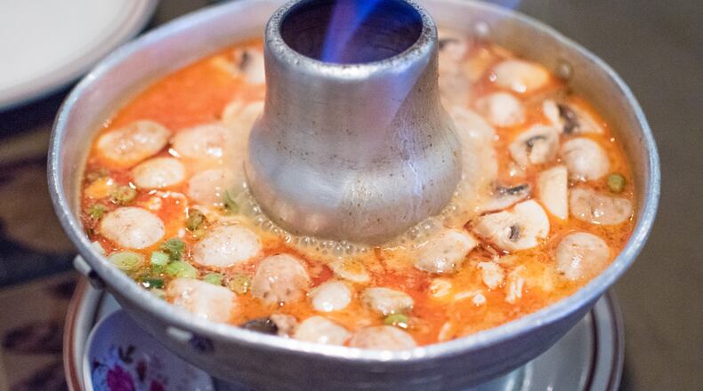 The Tom Ka coconut soup at Little Bangkok is served in spectacular fashion. CONTRIBUTED BY HENRI HOLLIS