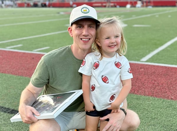 Fletcher Page, the AJC's new Georgia Tech beat writer, with daughter Bizzy, 4. (Family photo)