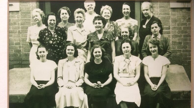 This photo hanging in the Center for Puppetry Arts, housed in the old Spring Street Elementary School building, shows faculty members from 1948. Photos: Jennifer Brett