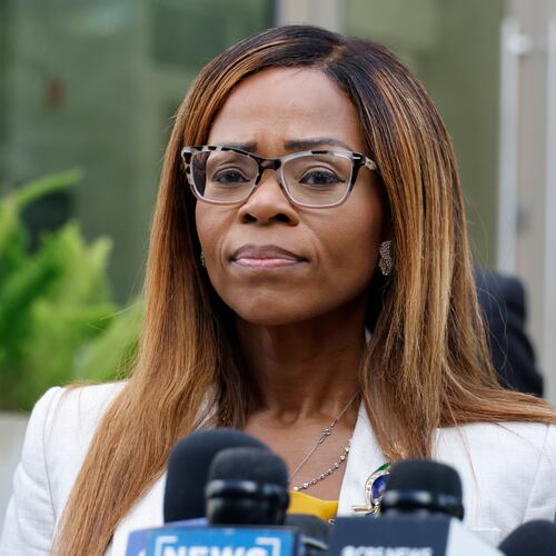 CORRECTS TO HEARING, NOT ARRAIGNMENT - U.S. Rep. Sheila Cherfilus-McCormick, D-Fla., speaks to the media after a hearing in federal court Monday, Dec. 29, 2025 in Miami. (AP Photo/Terry Renna)