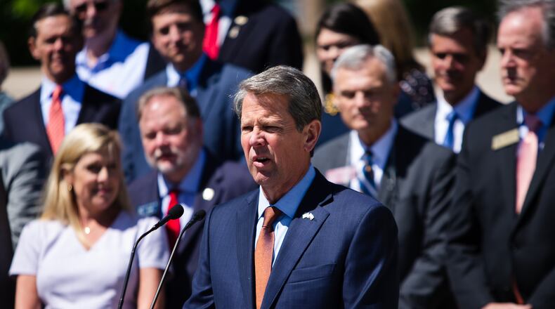 Governor Brian Kemp gives a speech during the Children, Family, and School Choice Bill Signing Ceremony on Thursday, May 6, 2021, in Liberty Plaza at the Georgia State Capitol in Atlanta. Governor Kemp signed House Bill 128, Senate Bill 42, Senate Bill 47, Senate Bill 246, and House Bill 606 into law at the event. CHRISTINA MATACOTTA FOR THE ATLANTA JOURNAL-CONSTITUTION