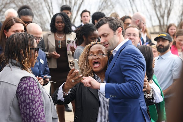 Democratic U.S. Sen. Jon Ossoff took a selfie at Liberty Plaza in Atlanta on Monday. (Jason Getz/AJC)