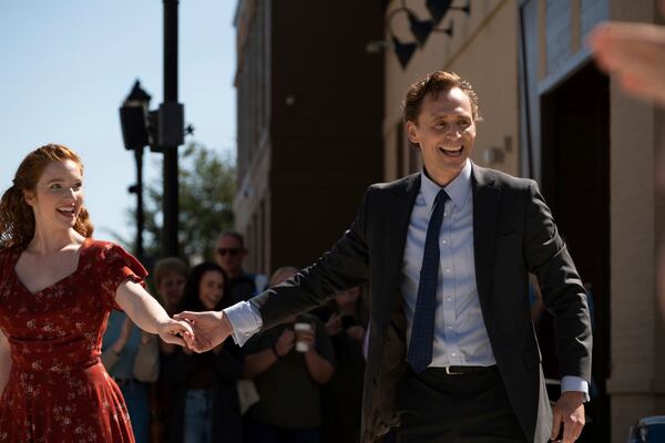 This image released by Neon shows Annalise Basso, left, and Tom Hiddleston in a scene from "The Life of Chuck." (Neon via AP)