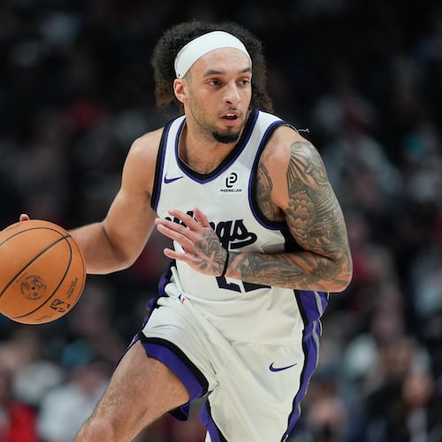 Sacramento Kings guard Devin Carter dribbles during the first half of an NBA basketball game against the Portland Trail Blazers, Sunday, April 12, 2026, in Portland, Ore. (Jenny Kane/AP)