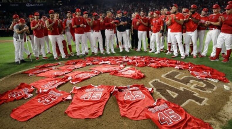 Angels players put their No. 45 jerseys on the mound to honor fallen teammate Tyler Skaggs after Anaheim completed a no-hitter against Seattle on Friday night.