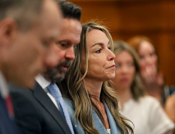 Defendant Karen Read sits with her defense team during her retrial at Norfolk Superior Court in Dedham, Mass., Tuesday June 3, 2025. (Greg Derr/The Patriot Ledger via AP, Pool)