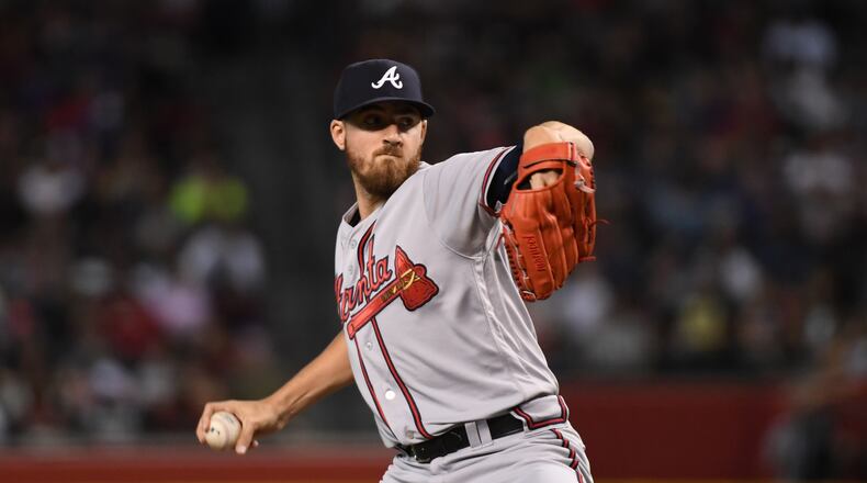 Kevin Gausman  of the Atlanta Braves delivers a pitch against the Arizona Diamondbacks. (Photo by Norm Hall/Getty Images)
