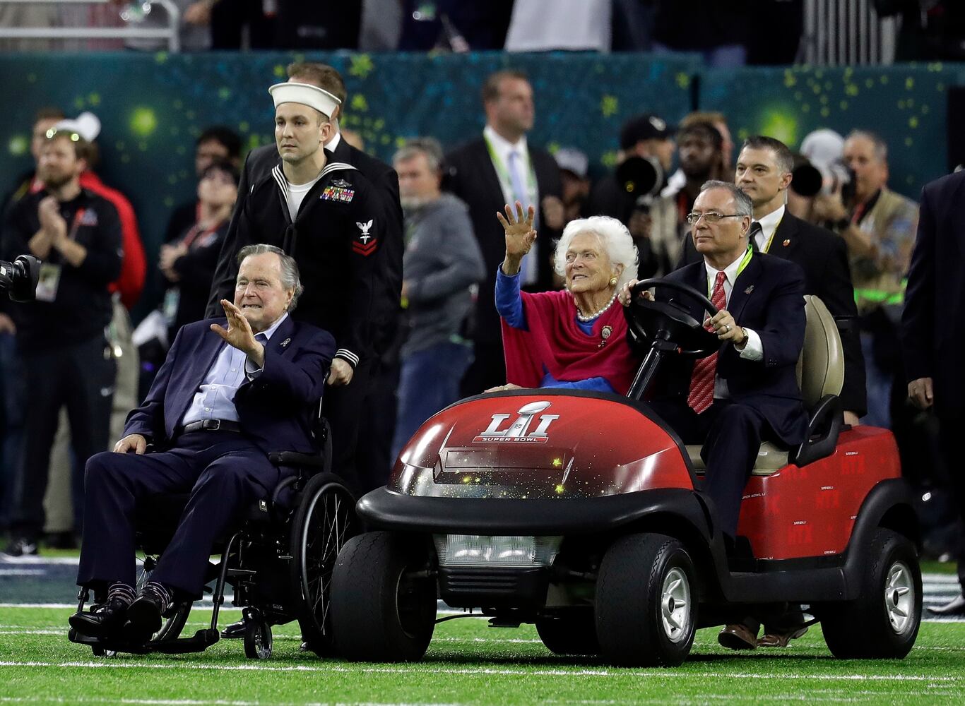 President George H.W. Bush flips coin at Super Bowl