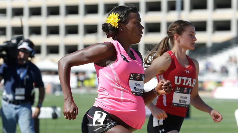 Alysia Montano competing while pregnant with her first child.