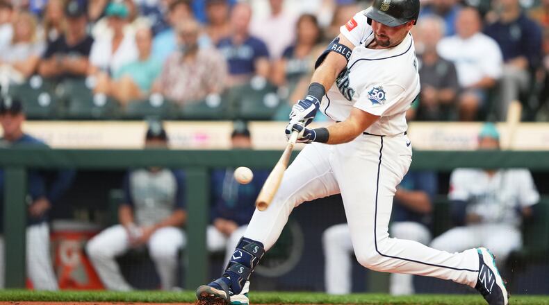 Seattle Mariners' Cal Raleigh hits a solo home run during the second inning of a baseball game against the Philadelphia Phillies, Tuesday, Aug. 25, 2026, in Seattle. (AP Photo/Lindsey Wasson)
