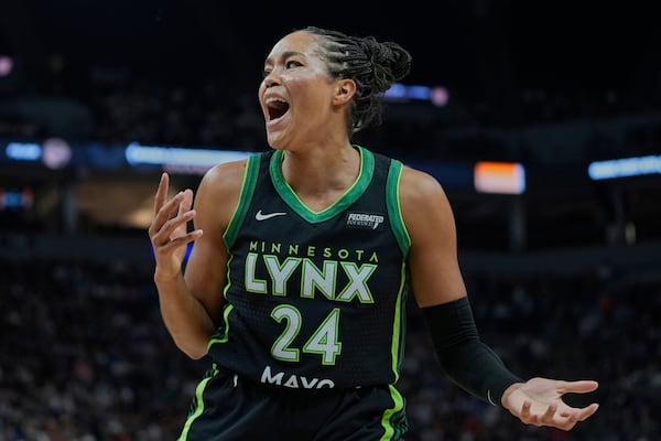 Minnesota Lynx forward Napheesa Collier (24) reacts after not receiving a foul call during the first half of the WNBA Commissioner's Cup championship basketball game against the Indiana Fever, Tuesday, July 1, 2025, in Minneapolis. (AP Photo/Abbie Parr)