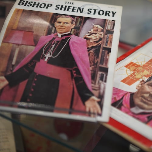 Artifacts and memorabilia depicting the late Archbishop Fulton Sheen are displayed in the Sheen Museum on July 15, 2026, in Peoria, Ill. (AP Photo/Jessie Wardarski)