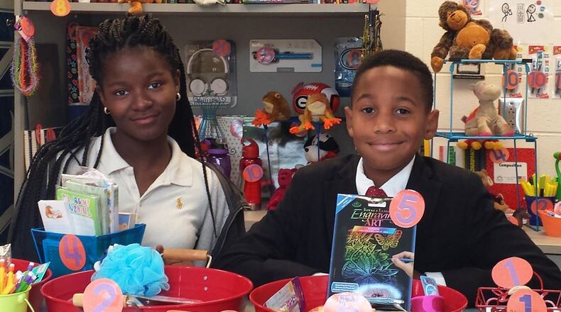 Students at Bennett’s Mill Middle display some of the items purchased for the Bronco Trading Post with a grant from the Fayette County Education Foundation.