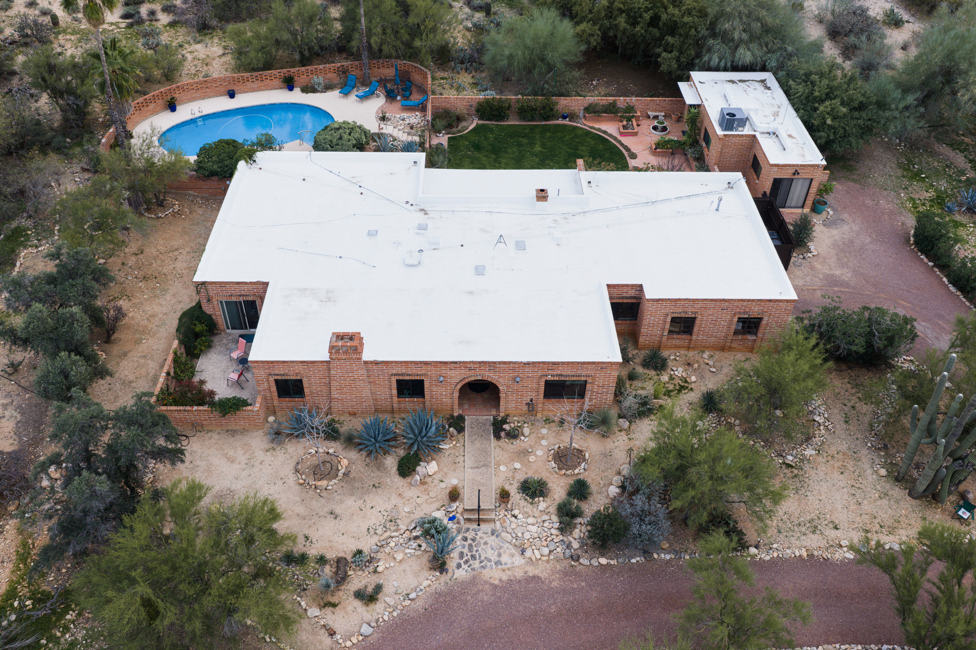 The home of Nancy Guthrie, the missing mother of “Today” show host Savannah Guthrie, is seen from above, Thursday, Feb. 5, 2026, in Tucson, Ariz. (AP Photo/Caitlin O'Hara)