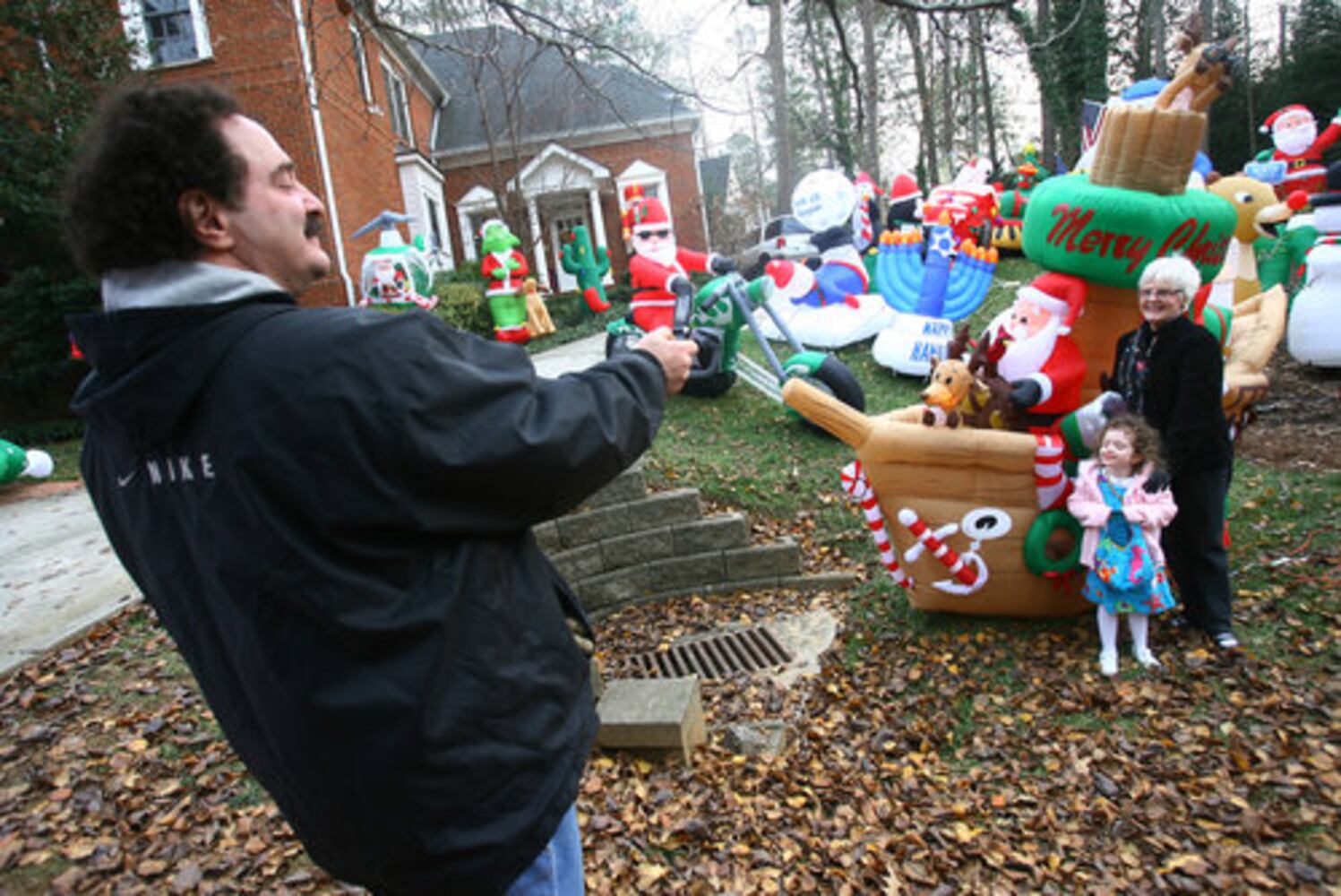 Atlanta home filled with holiday inflatables