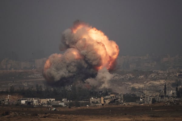 Smoke and fire rise to the sky following an Israeli army bombardment in the northern Gaza Strip, as seen from southern Israel, Thursday, July 10, 2025. (AP Photo/Leo Correa)