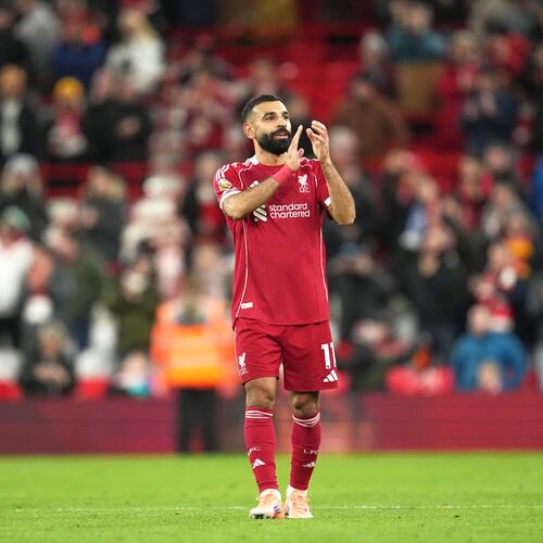 Liverpool's Mohamed Salah applauds supporters after the English Premier League soccer match between Liverpool and Brighton and Hove Albion in Liverpool, England, Saturday, Dec. 13, 2025. (AP Photo/Jon Super)