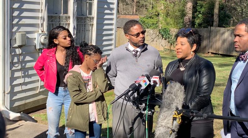 The Savage family - from left, Jailyn, Jori, Timothy and Jonjelyn  - along with lawyer Gerald Griggs (far right), met with the press on Wednesday morning to talk about their daughter, Joycelyn, whom they haven't seen in the two years since she's been with R. Kelly.