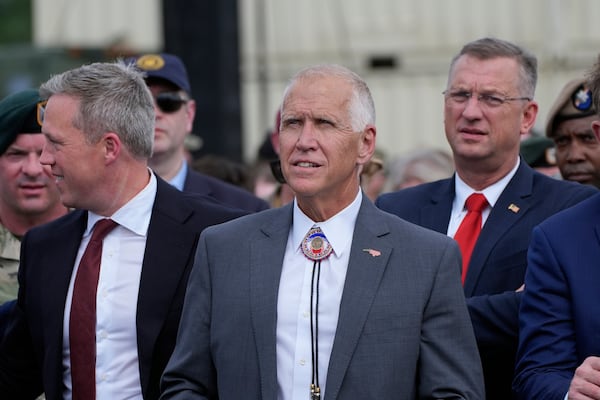 Army Secretary Daniel Driscoll (left), U.S. Sen. Thom Tillis (center) and Veterans Affairs Secretary Doug Collins attended a speech by President Donald Trump in North Carolina earlier this month.