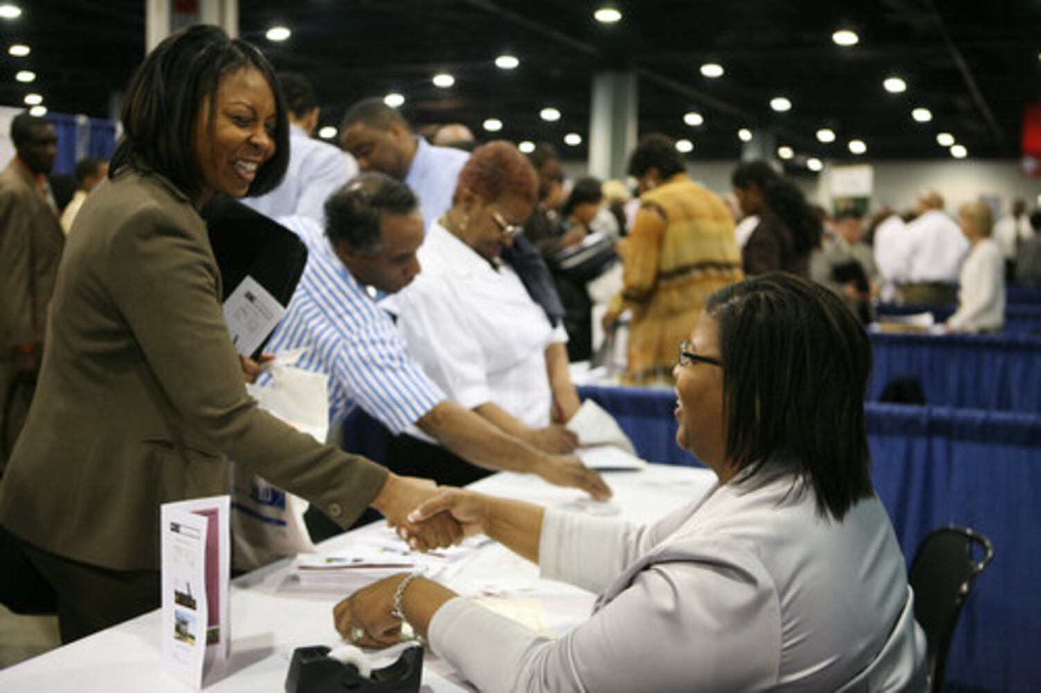 Job hunters line up at career fair