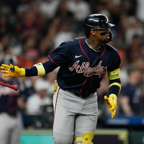 Atlanta Braves' Ronald Acuña Jr. tosses his bat after hitting a home run during the seventh inning of a baseball game against the Houston Astros in Houston, Friday, Sept. 18, 2026. (AP Photo/Ashley Landis)