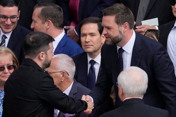 Ukraine's President Volodymr Zelenskyy, left, and Vice President JD Vance greet each other as Secretary of State Marco Rubio, center, looks on ahead of Pope Leo XIV's formal inauguration of his pontificate with a Mass in St. Peter's Square attended by heads of state, royalty and ordinary faithful, Sunday, May 18, 2025. (AP Photo/Gregorio Borgia)