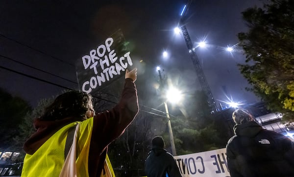 Two people were arrested after locking themselves to a crane 144 feet in the air to protest Atlanta’s Public Safety Training Center on  March 27, 2024. The training center was the source of numerous protests and clashes between demonstrators and law enforcement. (John Spink/AJC file photo)