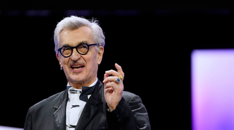 FILE - Jury president Wim Wenders speaks at the opening ceremony of the International Film Festival, Berlinale, in Berlin, on Feb. 12, 2026. (AP Photo/Markus Schreiber, File)