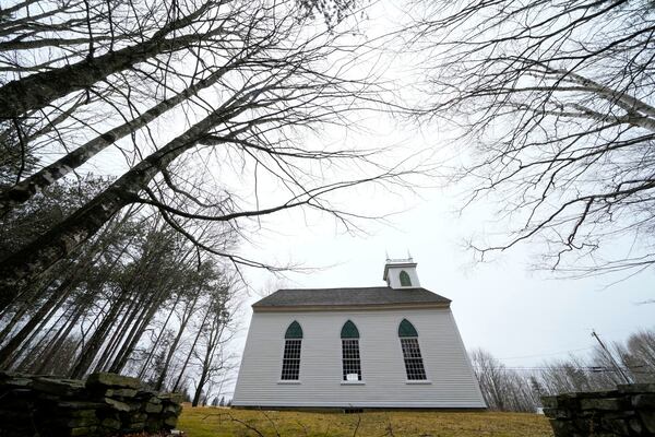 The South Solon Meeting House, a clapboard building with Gothic architectural influences, is pictured, Sunday, April 6, 2025, in Solon, Maine. (AP Photo/Robert F. Bukaty)