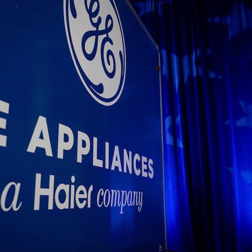 FILE - A trailer with the GE logo is seen at a stage area at GE Appliances global headquarters, Aug 13, 2025, in Louisville, Ky. (AP Photo/Jon Cherry, file)